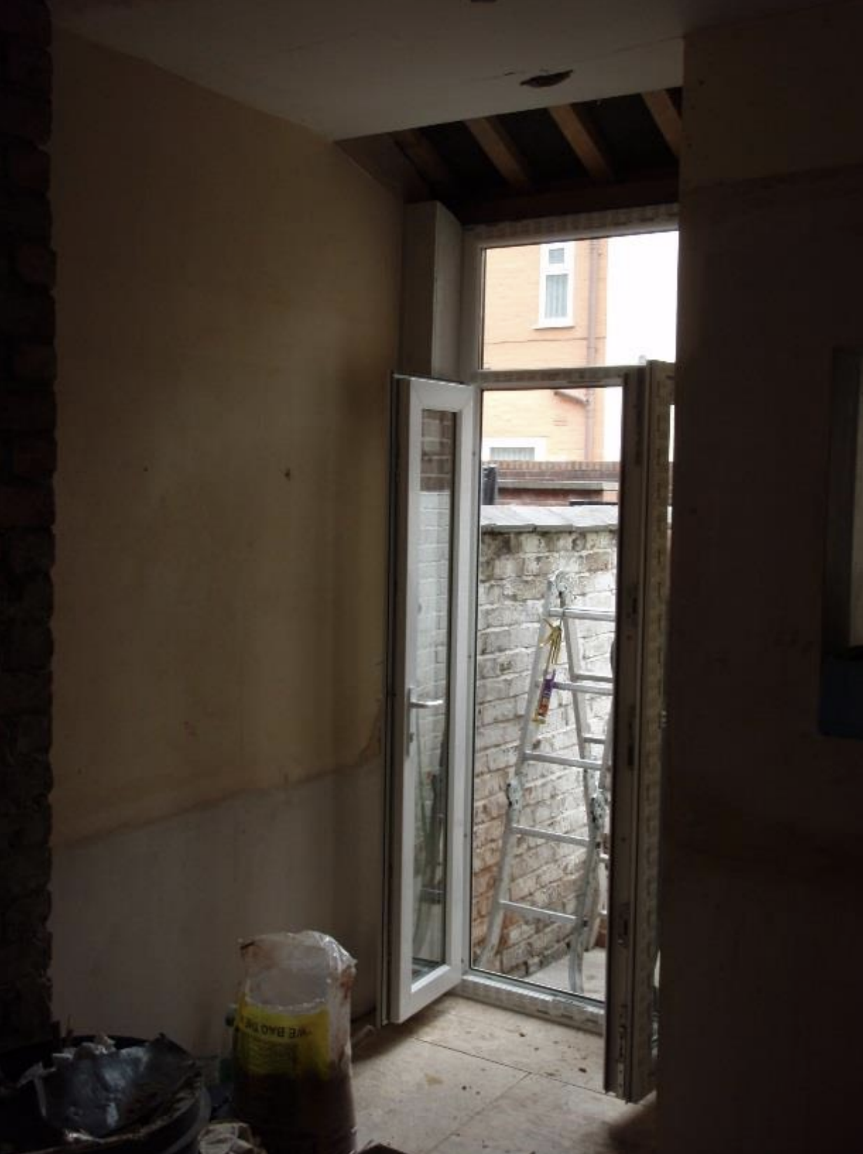 Bay window ceiling above French doors
